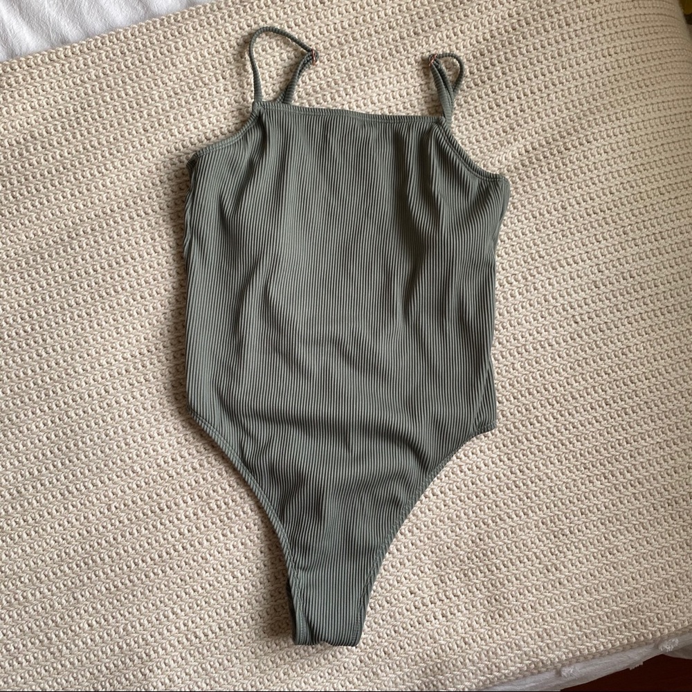 green one piece bathing suit